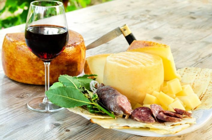 Pecorino-cheese-with-wine-and-sausage-shutterstock_1216589599